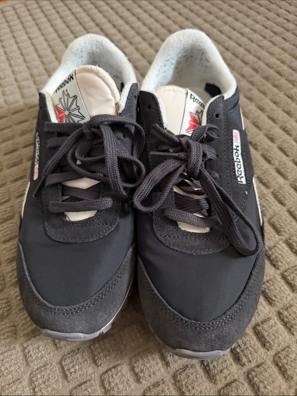 Reebok women’s Black and White Low-Top Sneakers